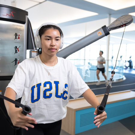 student exercising at the spartan recreation and aquatic center